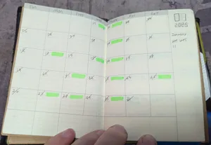 A calendar with highlights for days with activities